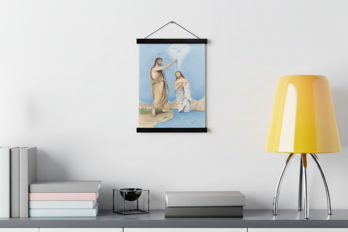 Baptism of Jesus print in a black magnetic bar hanger above a gray console with books and a yellow lamp